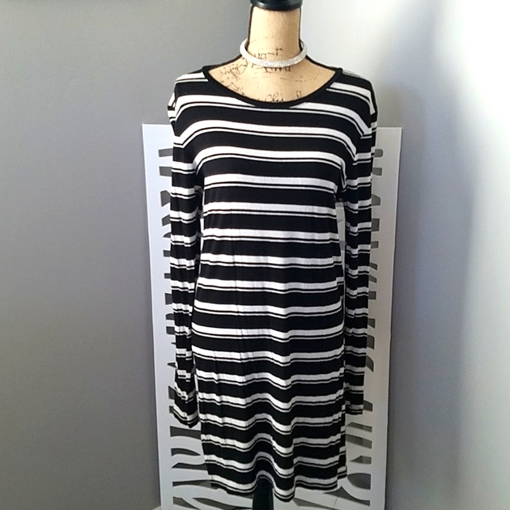 Long sleeved, slit up both sides, stretchy, knee length t-shirt